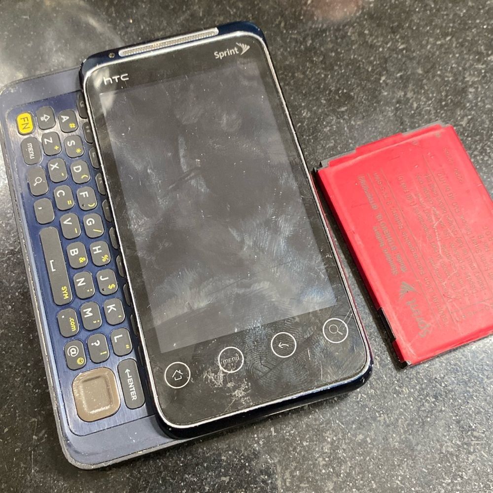 sprint, slide cell phone with hidden keyboard purple htc